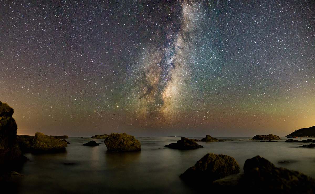 milky way rocks under milky way night